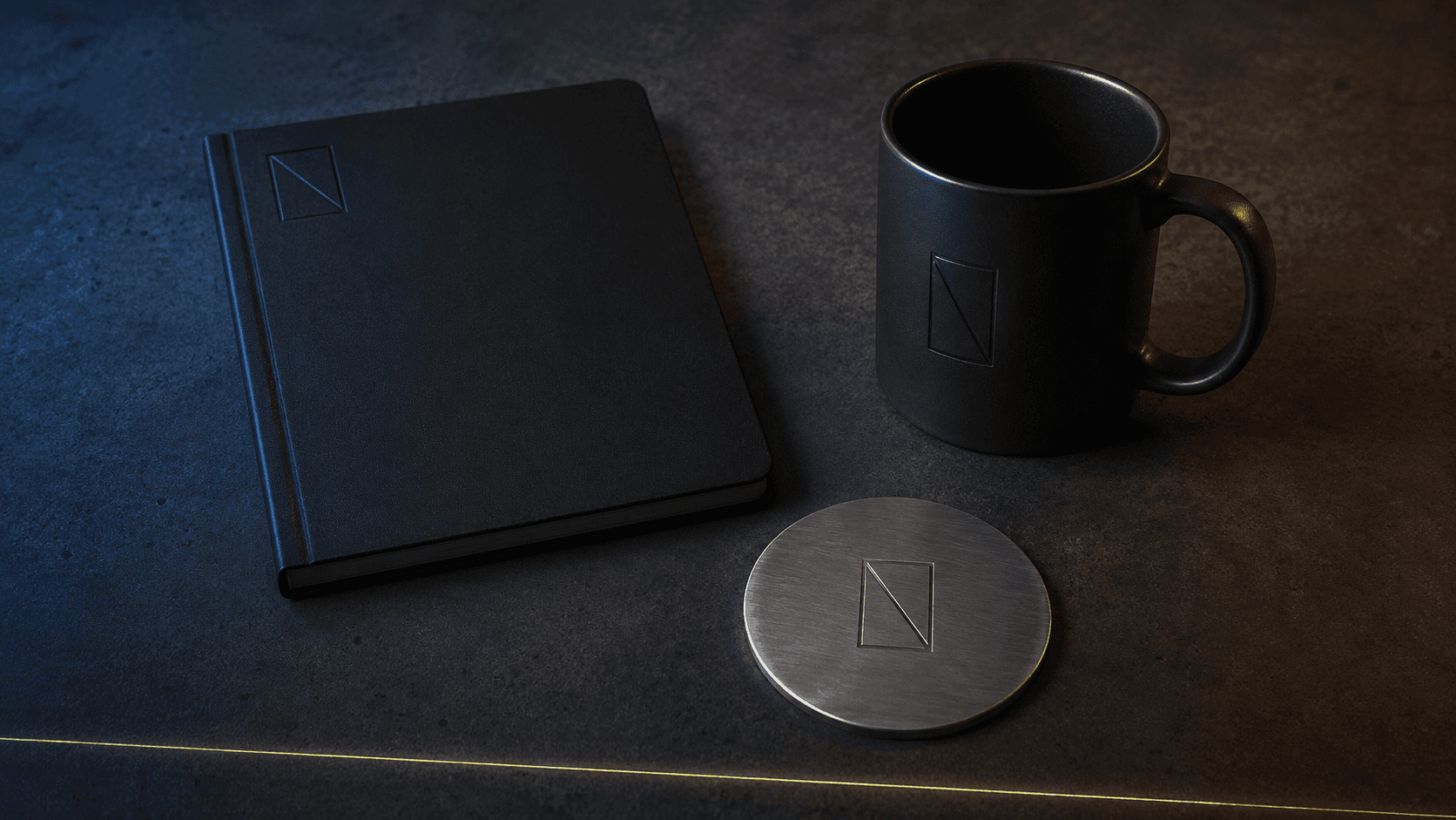Notebook, mug, coaster — one mark across every internal artifact.